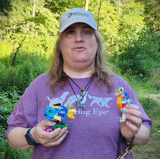 Picture of Jolene holding fish and sea horse LEGO buildsJolene N.