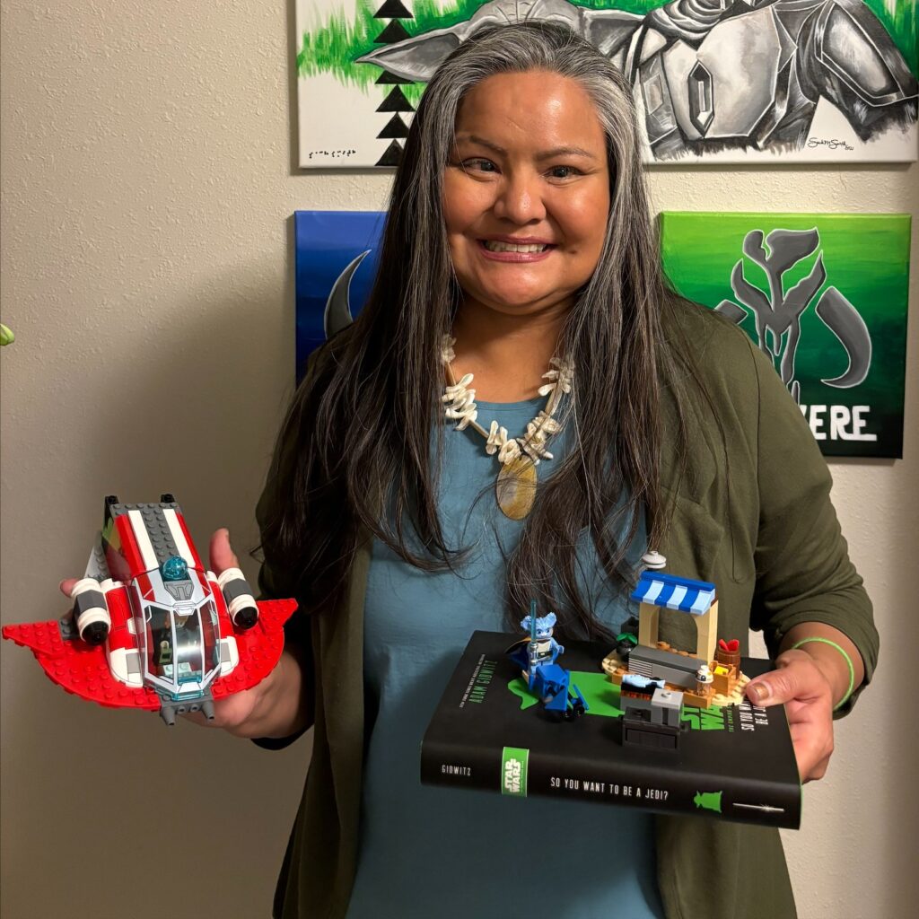 Picture of woman with Star Wars LEGO build