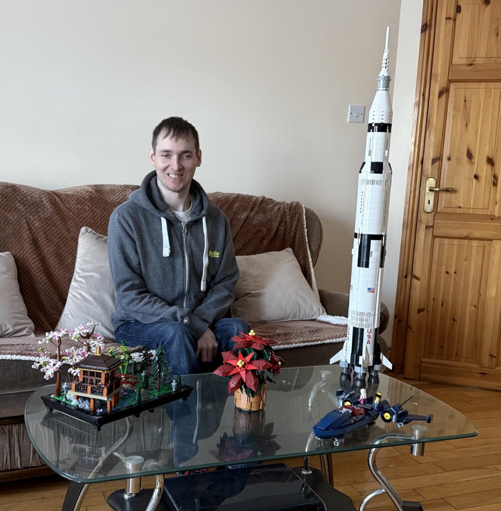 Niall next to Saturn V rocket and Tranquil Garden